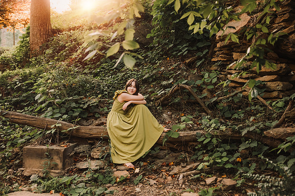 High School senior in a wooded area