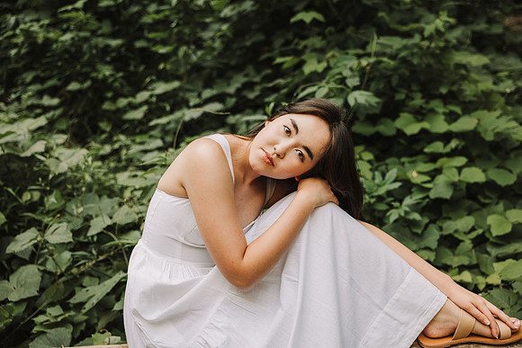 portrait of a girl in a wooded area