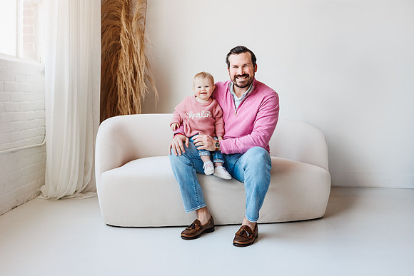cute daddy and daughter sit together for a session in atlanta