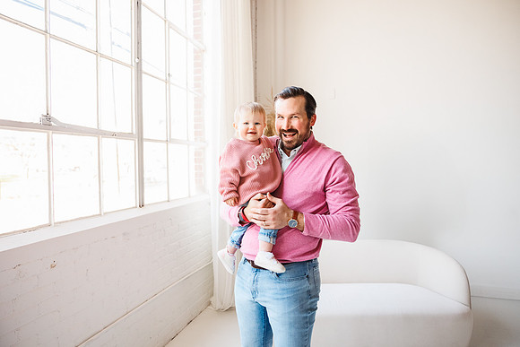 cute daddy daughter duo smile for photographer monica carlson