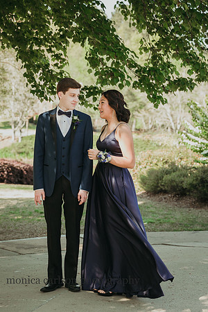 teen couple dressed up before a prom at their high school in suwanee, georgia