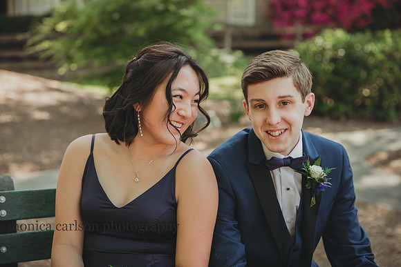 teen couple laugh together before their prom at Lambert High school