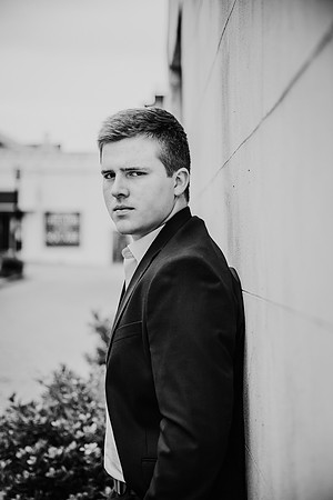 black and white image of a senior boy by monica carlson