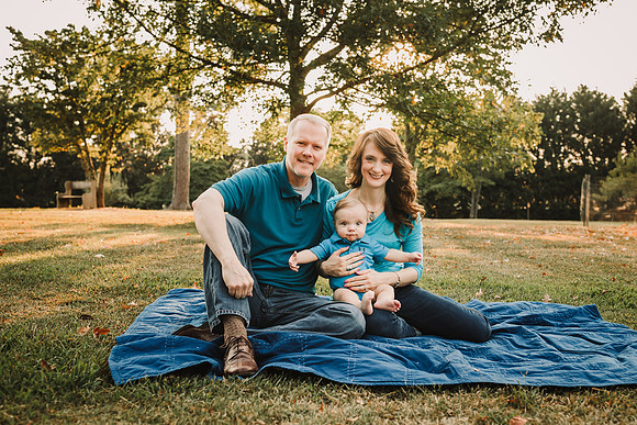 portrait of a family of three at Barrington Hall in Roswell