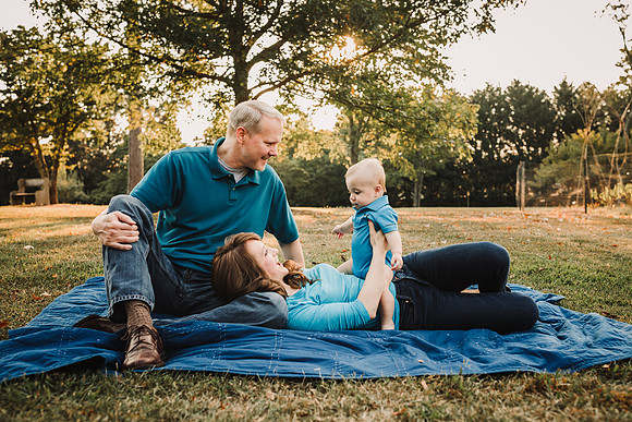 Golden backlit image of a family enjoying a beautiful day in roswell, GA