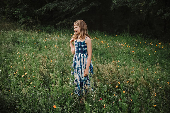 girl happily looks into the distance at a farm in Lawernceville, GA