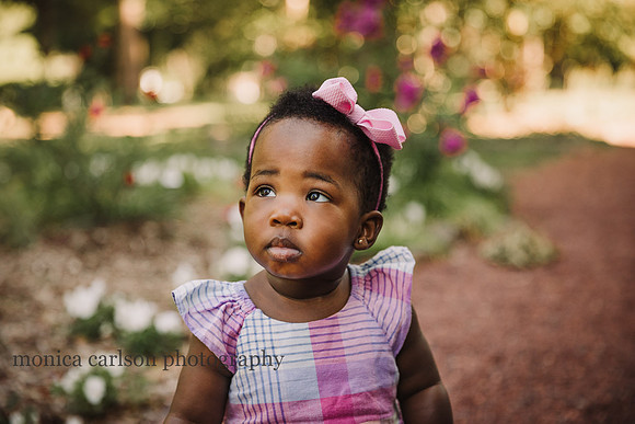 serious looks from a chubby cheeked baby by monica carlson