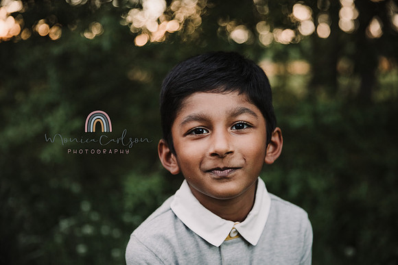 backlit image of a happy young boy by monica carlson