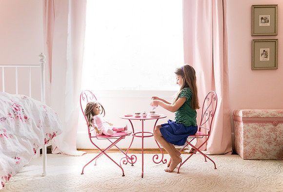 girl having a tea party in her home in atlanta