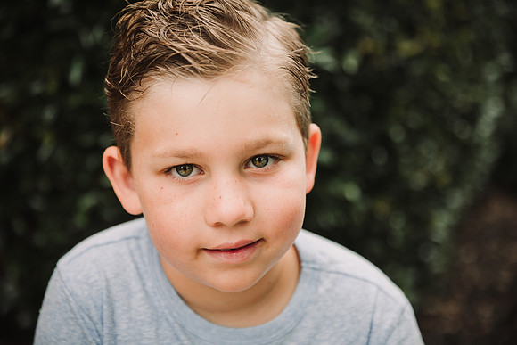 elementary aged boy looking at the camera