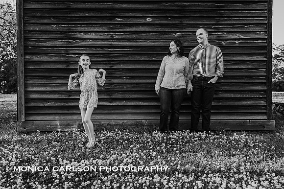 Casual portrait of a family of three by monica carlson