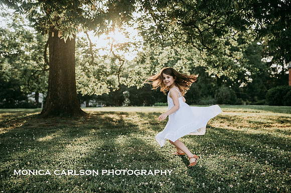 little girl spinning in roswell, GA during a family photo session