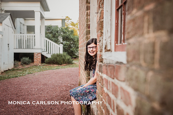 tween girl laughing at a historic home in Roswell, GA