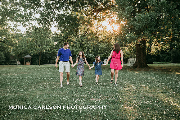 family walking behind barrington hall in rowell, ga