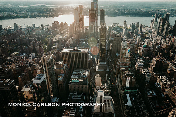 view of the hudson river from the observation deck of the empire state building by monica carlson