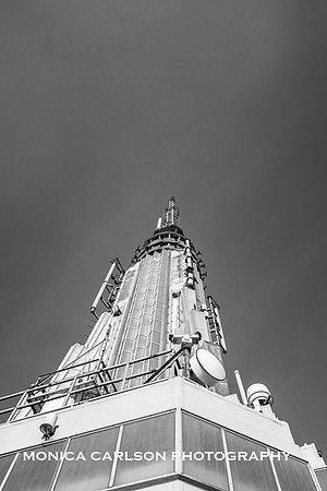 view of the very top of the empire statue building looking up from the observation deck