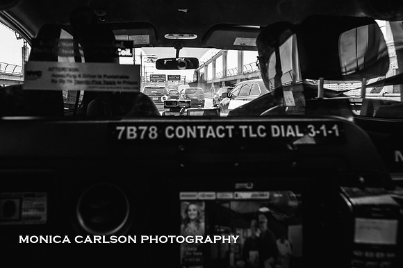view from the back of a NYC taxi