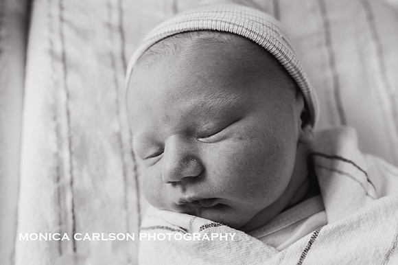 portrait of a newborn baby at the hospital during his first 48 hours of life by monica carlson photography