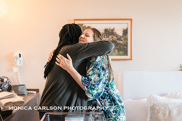 mother hugging her obstetrician after delivering her baby at Northside Hospital