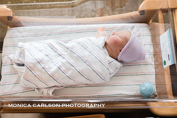 newborn baby boy in his hospital bassinet in Atlanta, GA