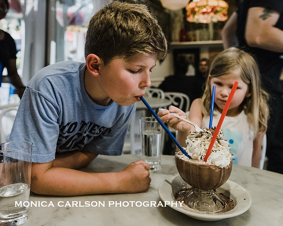 boy enjoying a frozen hot chocolate in Serendipity