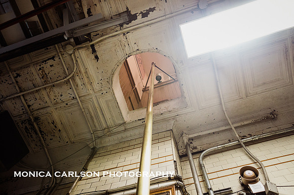 antique fire pole in a new york city fire station