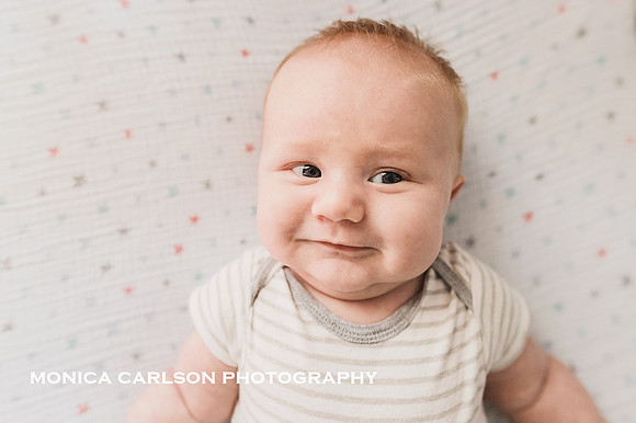 Smiling newborn baby photo