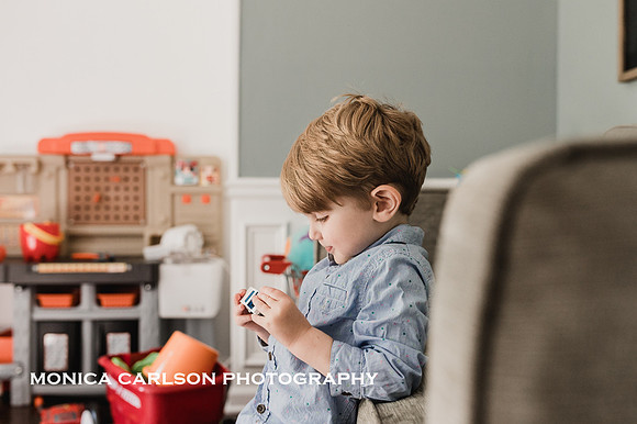 Little boy in his playroom during a photo session with Monica Carlson