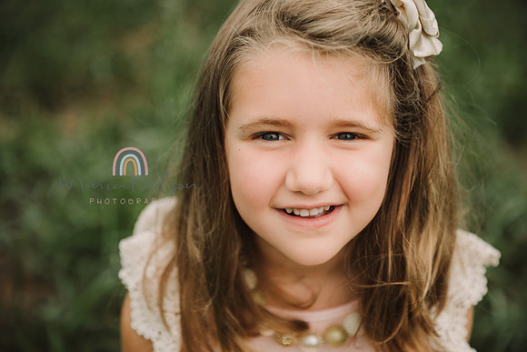 portrait of a happy girl by monica carlson