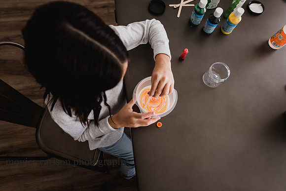 view from above of a girl making slime