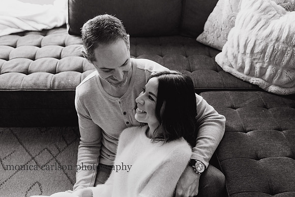 quiet portrait from above of a man and woman looking at each other by monica carlson