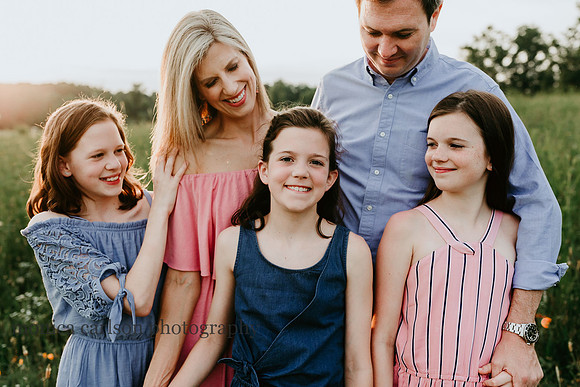 family looking at their youngest daughter at Prospect farms