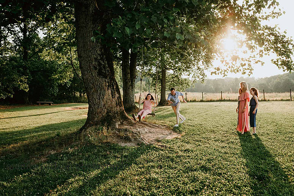 family watching a girl swing at Prospect farms