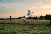ballerina leaping on a field at a farm in north Georgia