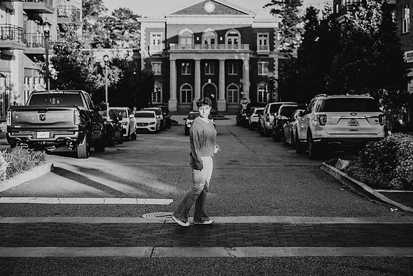Teenager crossing the street in downtown alpharetta