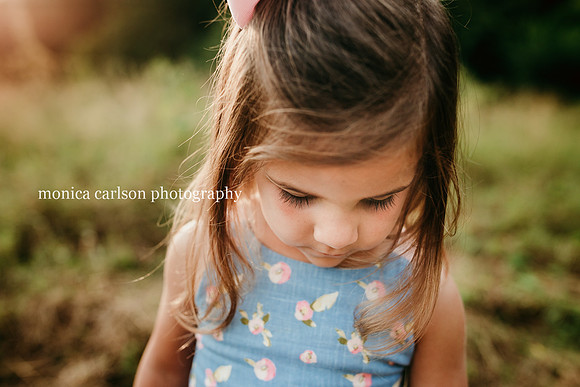 golden photo of a little girls eye lashes by monica carlson