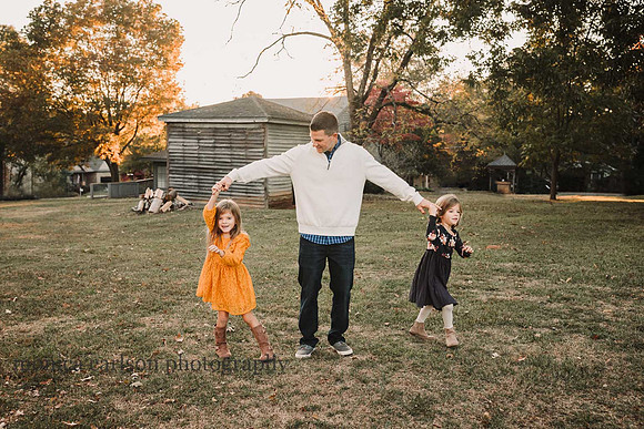 father and his daughters dancing at Barrington hall