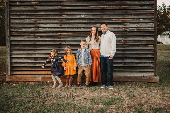 Family photo in front of the smoke house on the Barrington Hall property