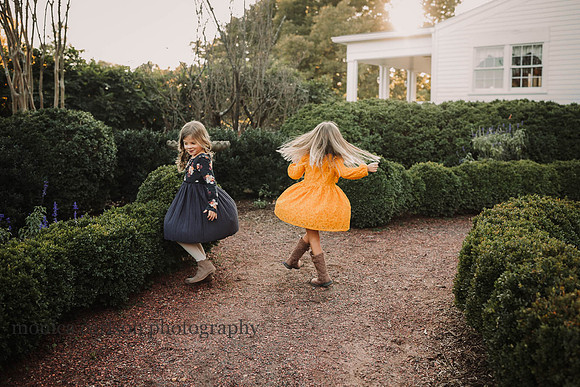 Girls twirling at a historic home in roswell, georgia