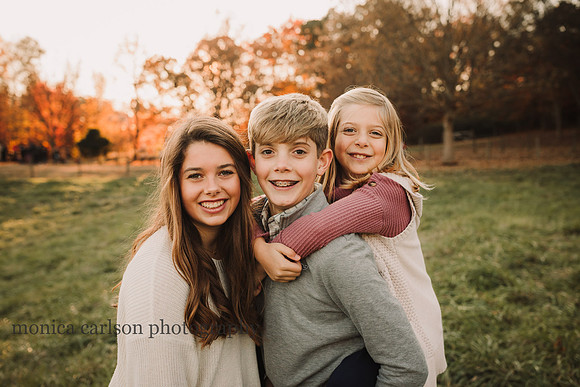 portrait of three sweet siblings at Mcdaniel family farm