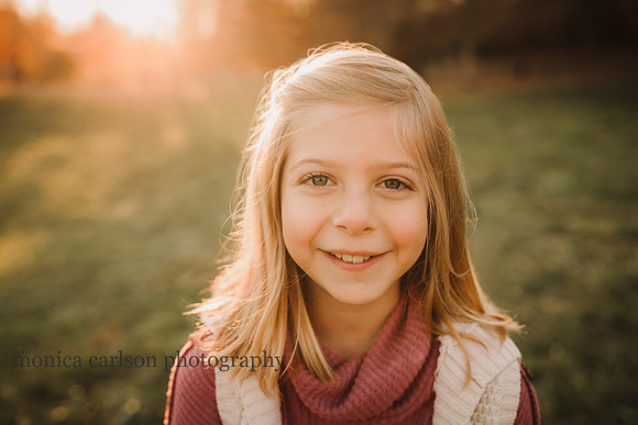 portrait of a blonde tween at sunset