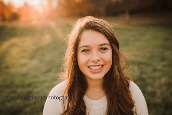 portrait of a brunette teenager at sunset by monica carlson photography