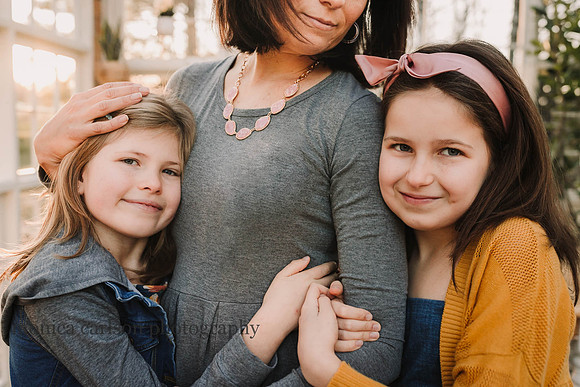 Mother and her girls hugging at Prospect farm