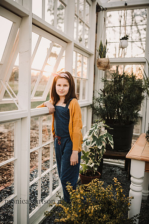 Happy Girl in a greenhouse at Prospect farms
