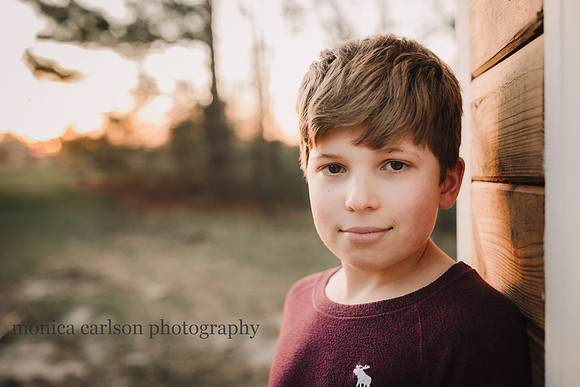 Happy tween boy at sunset in Lawrenceville, Georgia