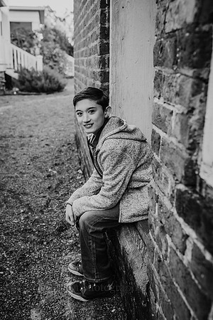 handsome young man looking at the camera