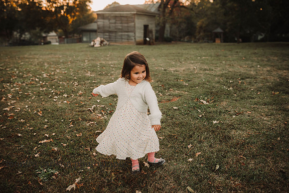 sweet little girl dancing during a session with monica carlson photography
