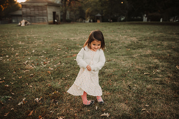 little girl clasping her hands while she dances at Barrington Hall