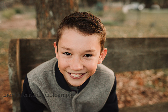 smiling teenage boy by monica carlson photography