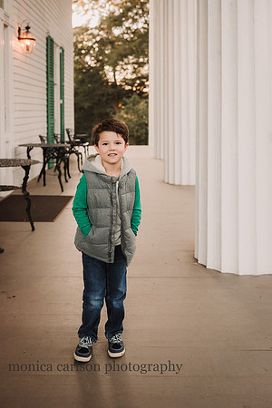 Young boy standing on the patio of Barrington Hall in Roswell, GA